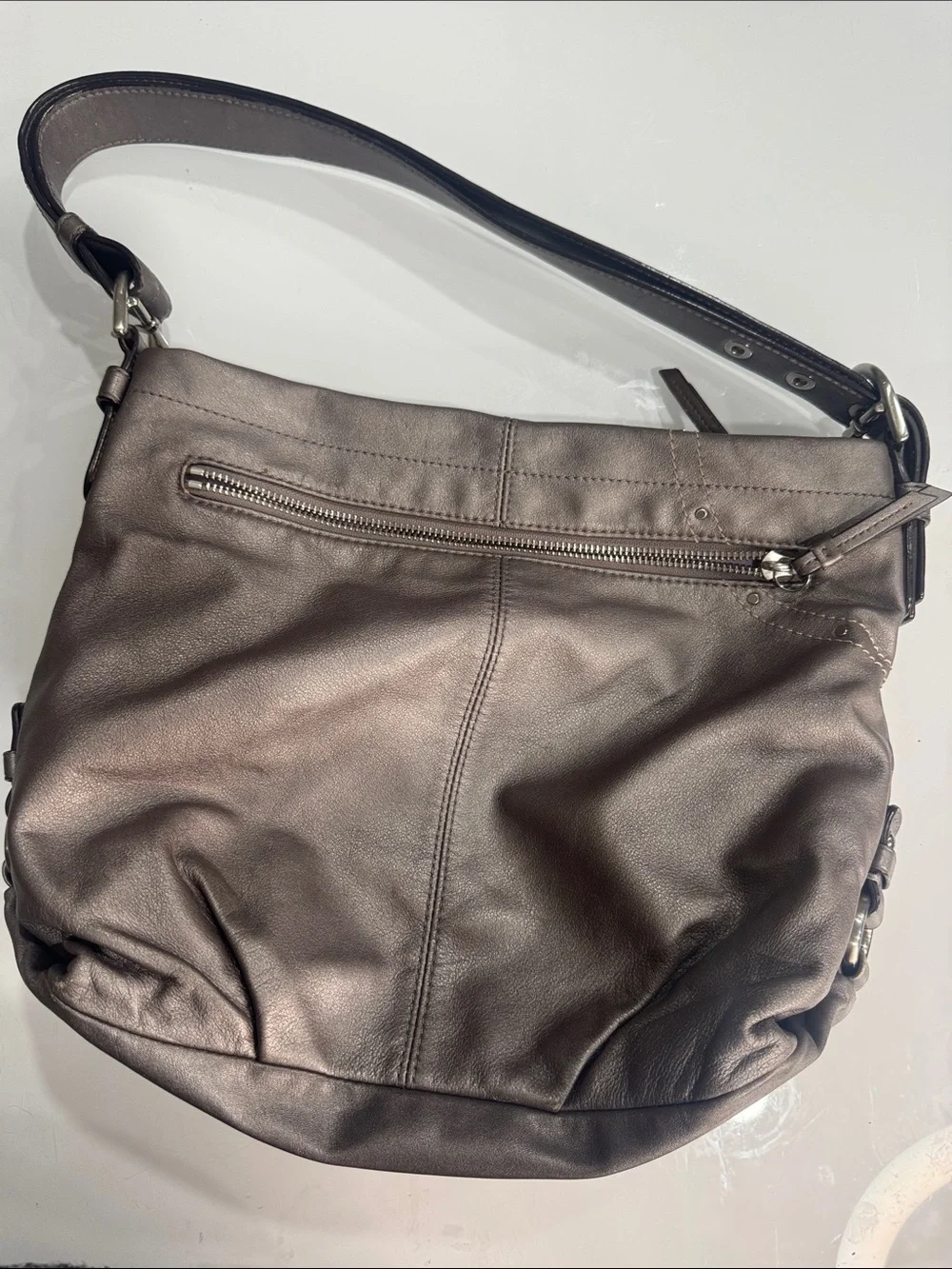 Coach Y2K Madison hobo bag featuring metallic pewter leather and silver studded